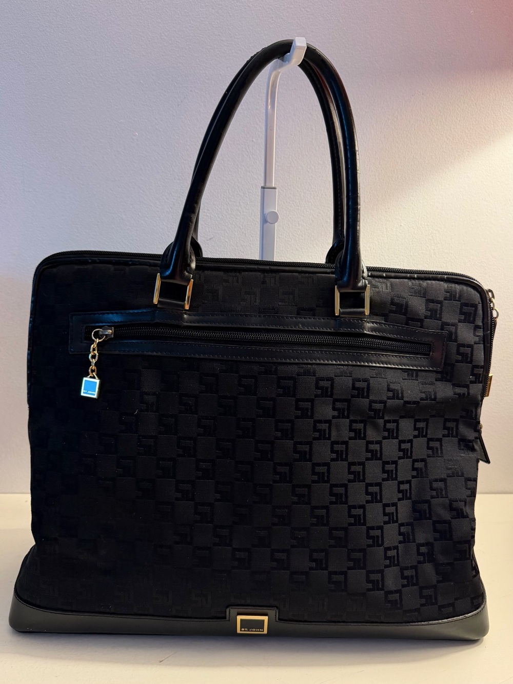 St. John large ,made in Italy, monogrammed canvas and leather tote.